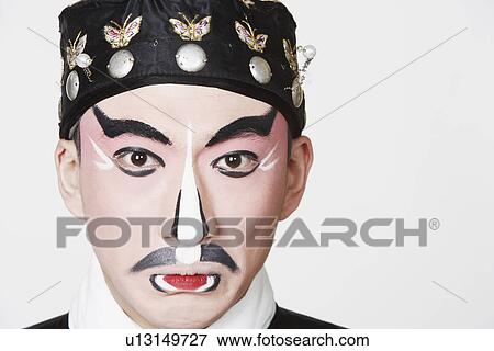 Portrait of a male Chinese opera performer making a face View Large Photo Image Stock Photo - Portrait of a male Chinese opera performer making a face. Fotosearch