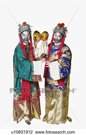 Portrait of two male Chinese opera performers holding bowls full of gold coins View Large Photo Image Stock Image - Portrait of two male Chinese opera performers holding bowls full of gold coins. Fotosearch