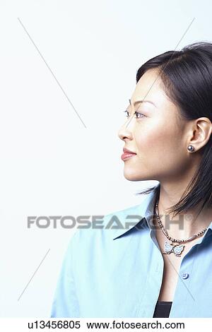 Close-up of a businesswoman looking sideways View Large Photo Image Stock Photography - Close-up of a businesswoman looking sideways. Fotosearch