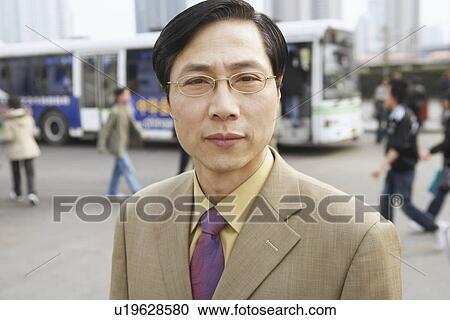 Portrait of a businessman View Large Photo Image Stock Image - Portrait of a businessman. Fotosearch