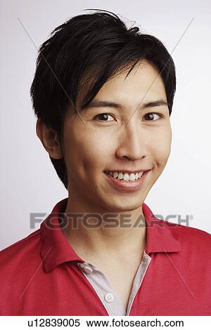Portrait of a young man smiling View Large Photo Image Stock Photography - Portrait of a young man smiling. Fotosearch