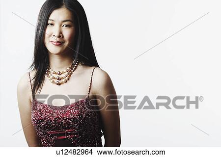 Portrait of a young woman smiling View Large Photo Image Picture - Portrait of a young woman smiling. Fotosearch