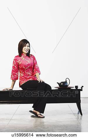 Picture - Portrait of a young woman smiling. Fotosearch