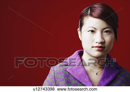 Stock Photo - Portrait of a young woman. Fotosearch