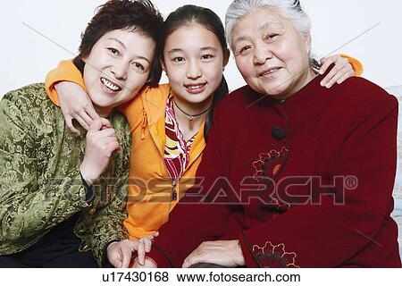 Portrait of a young woman with her mother and her grandmother View Large Photo Image Stock Photo - Portrait of a young woman with her mother and her grandmother. Fotosearch