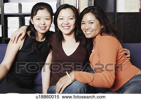 Portrait of three young women smiling View Large Photo Image Stock Photography - Portrait of three young women smiling. Fotosearch