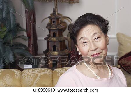 Stock Photo - Portrait of a senior woman smiling. Fotosearch