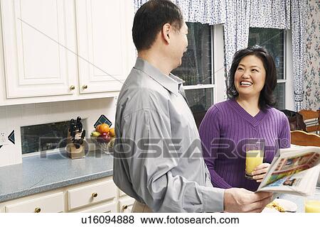 Side profile of a senior man and a mature woman smiling View Large Photo Image Stock Photo - Side profile of a senior man and a mature woman smiling. Fotosearch