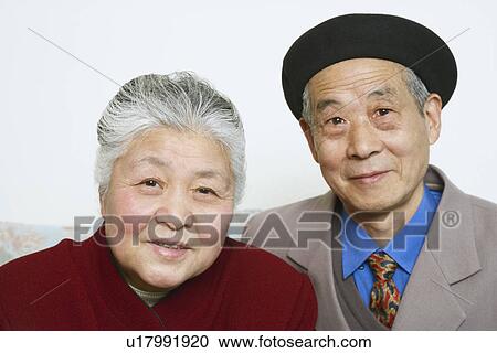 Portrait of a senior couple smiling View Large Photo Image Stock Image - Portrait of a senior couple smiling. Fotosearch
