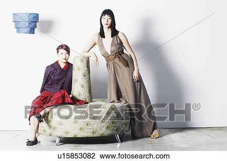 Stock Image - Portrait of two young women. Fotosearch