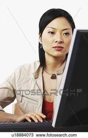 Close-up of a businesswoman using a computer View Large Photo Image Stock Image - Close-up of a businesswoman using a computer. Fotosearch