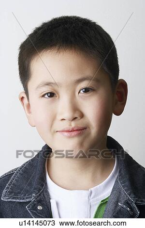 Portrait of a boy grinning View Large Photo Image Stock Image - Portrait of a boy grinning. Fotosearch