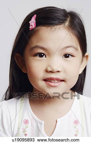 Portrait of a girl smiling View Large Photo Image Stock Image - Portrait of a girl smiling. Fotosearch