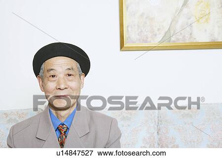 Stock Photo - Portrait of a senior man smiling. Fotosearch