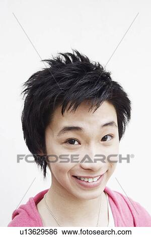 Portrait of a teenage boy smiling View Large Photo Image Stock Photograph - Portrait of a teenage boy smiling. Fotosearch