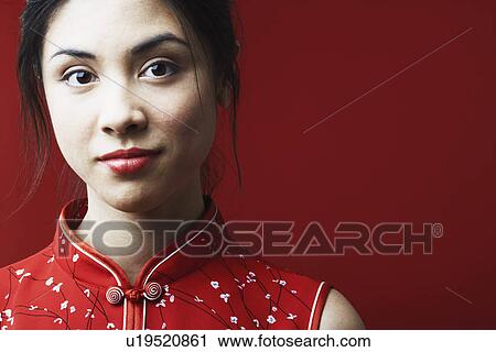 Portrait of a young woman grinning View Large Photo Image Stock Image - Portrait of a young woman grinning. Fotosearch