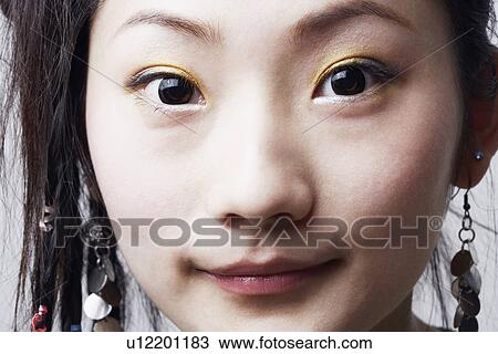 Stock Image - Portrait of a young woman. Fotosearch
