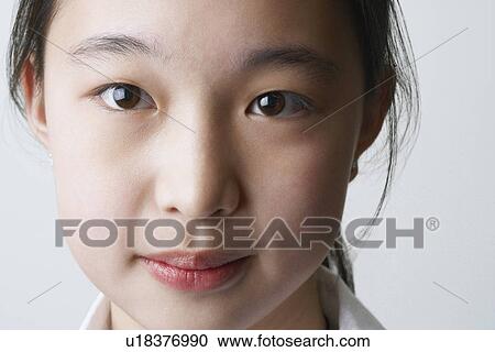 Portrait of a young woman View Large Photo Image Stock Image - Portrait of a young woman. Fotosearch