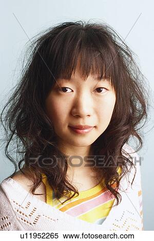 Portrait of a young woman View Large Photo Image Stock Photography - Portrait of a young woman. Fotosearch