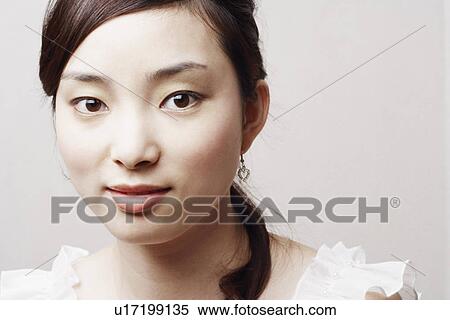 Stock Photography - Portrait of a young woman. Fotosearch