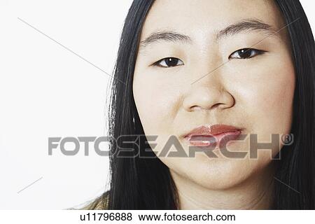 Portrait of a young woman View Large Photo Image Stock Photo - Portrait of a young woman. Fotosearch
