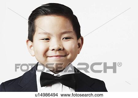Close-up of a boy smiling View Large Photo Image Picture - Close-up of a boy smiling. Fotosearch