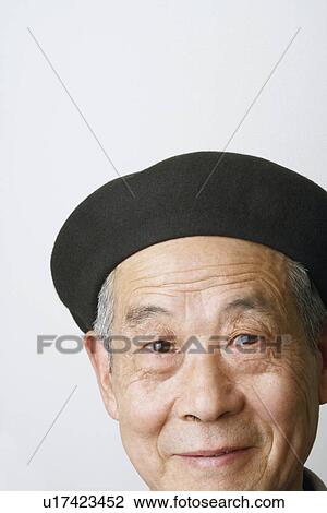 Stock Image - Close-up of a senior man smiling. Fotosearch