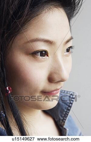 Stock Photo - Close-up of a teenage girl. Fotosearch