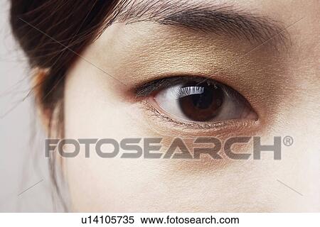 Close-up of a young woman's eye View Large Photo Image Stock Photography - Close-up of a young woman's eye. Fotosearch
