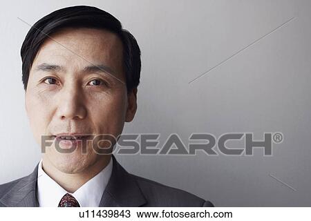 Portrait of a businessman thinking View Large Photo Image Stock Image - Portrait of a businessman thinking. Fotosearch