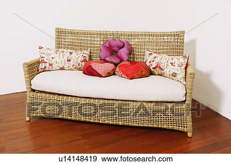 Stock Photo - Close-up of a couch at the corner of a room. Fotosearch