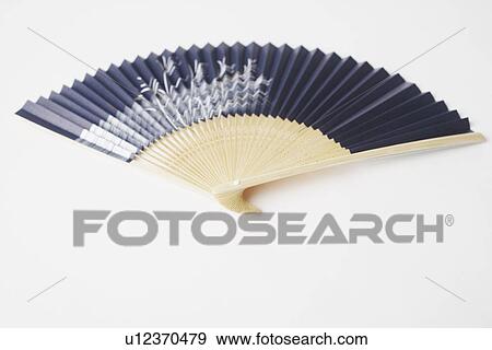 Stock Photo - Close-up of a folding fan. Fotosearch