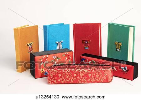 Close-up of books and a pencil case View Large Photo Image Stock Image - Close-up of books and a pencil case. Fotosearch