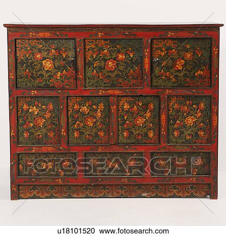Stock Image - Floral pattern on a wooden cabinet. Fotosearch