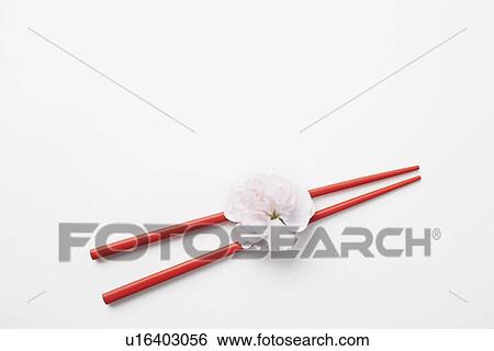 High angle view of a flower with a pair of chopsticks View Large Photo Image Stock Photograph - High angle view of a flower with a pair of chopsticks. Fotosearch