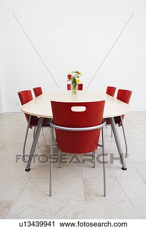 Table and chairs in a conference room View Large Photo Image Stock Image - Table and chairs in a conference room. Fotosearch