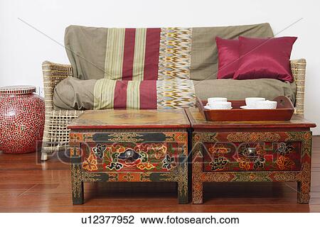 Tea cups and a tray on the table View Large Photo Image Stock Image - Tea cups and a tray on the table. Fotosearch