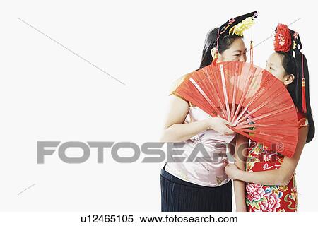 Stock Photography - Close-up of a mother and her daughter. Fotosearch