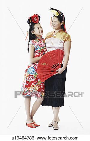Mother and her daughter looking at each other View Large Photo Image Stock Photograph - Mother and her daughter looking at each other. Fotosearch