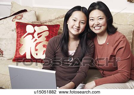 Stock Image - Portrait of a daughter and her mother. Fotosearch