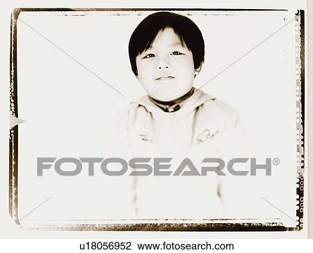 Stock Image - Portrait of a girl grinning. Fotosearch