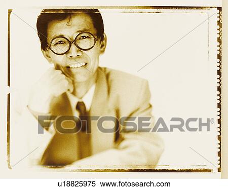 Stock Photography - Portrait of a mature man smiling . Fotosearch