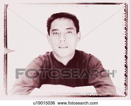 Stock Photograph - Portrait of a young man . Fotosearch