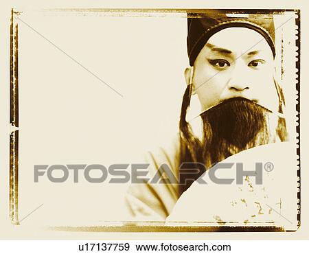 Stock Photo - Portrait of a young man wearing traditional costume. Fotosearch
