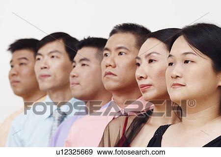 Stock Photo - Close-up of business executives in a row. Fotosearch