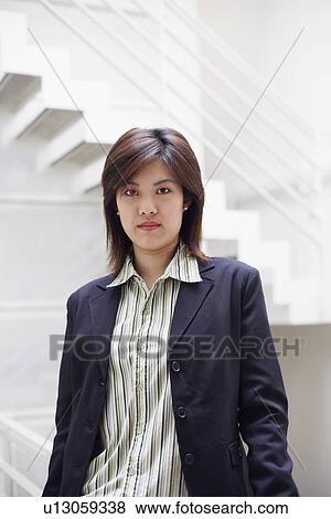 Stock Photo - Portrait of a businesswoman posing. Fotosearch