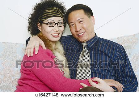 Stock Photo - Portrait of a mature couple embracing each other. Fotosearch