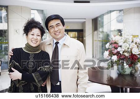 Stock Photo - Portrait of a mature couple smiling. Fotosearch