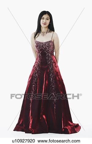 Stock Image - Portrait of a young woman smiling. Fotosearch