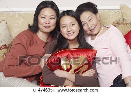 Portrait of a girl with her mother and her grandmother View Large Photo Image Stock Image - Portrait of a girl with her mother and her grandmother. Fotosearch